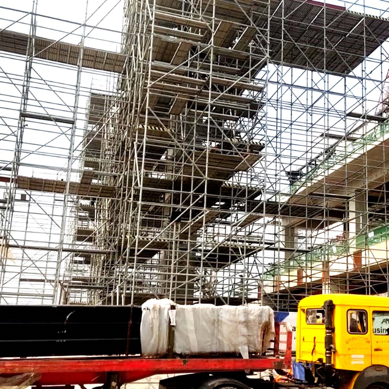 Scaffolding erection by TZ arround Airport Terminal 3 under ADC
